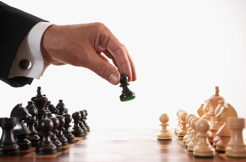 People playing chess to show strategy