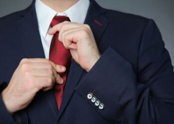Man wearing blue business suit and tie