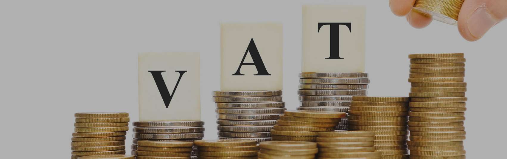 VAT scrabble letters on coins