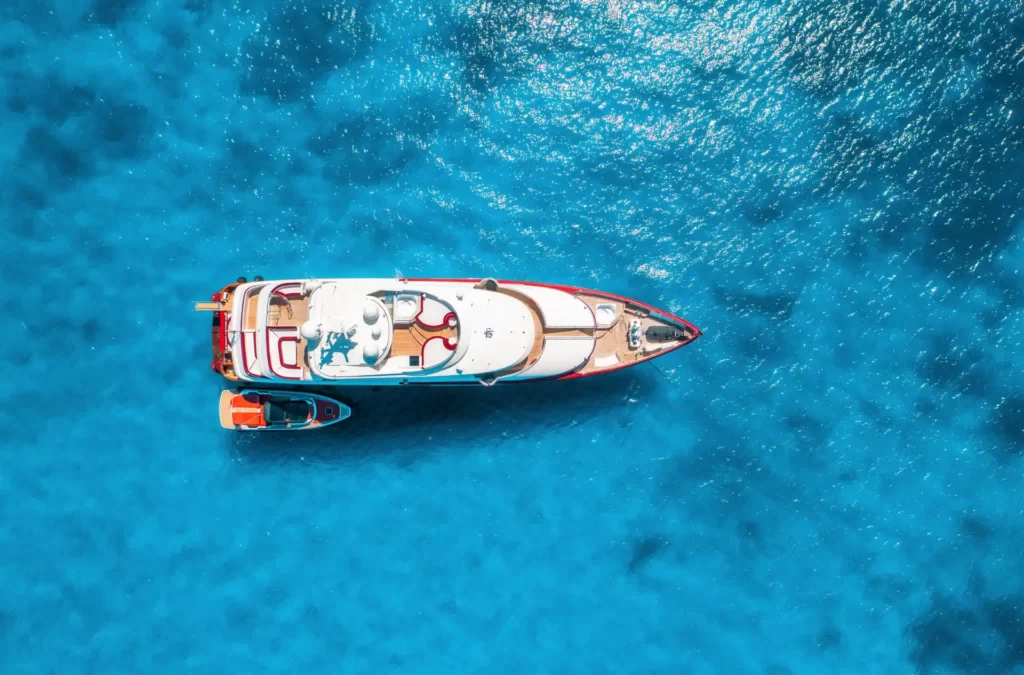aerial-view-of-beautiful-luxury-yacht-and-boat-in-2022-12-07-01-25-36-utc